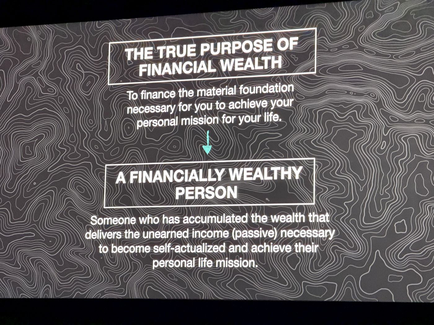 Slide defining the true purpose of financial wealth and a financially wealthy person
