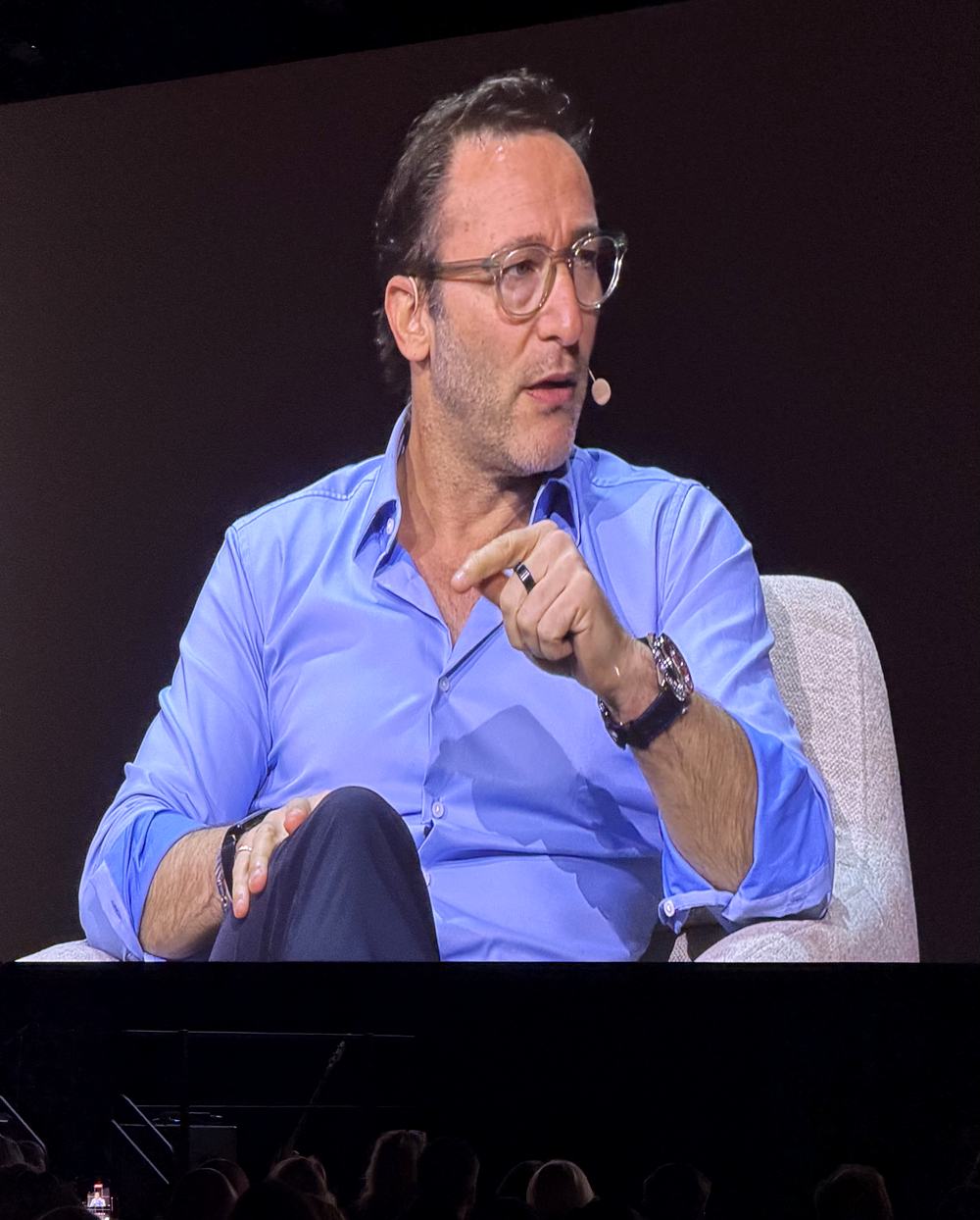 Close up of Simon Sinek speaking on the main screen at Mega Camp 2026